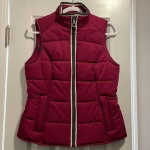Women’s Ariat Winter Vest - magenta/berry w a charcoal and ivory trim.